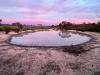 Sunrise at waterhole camp